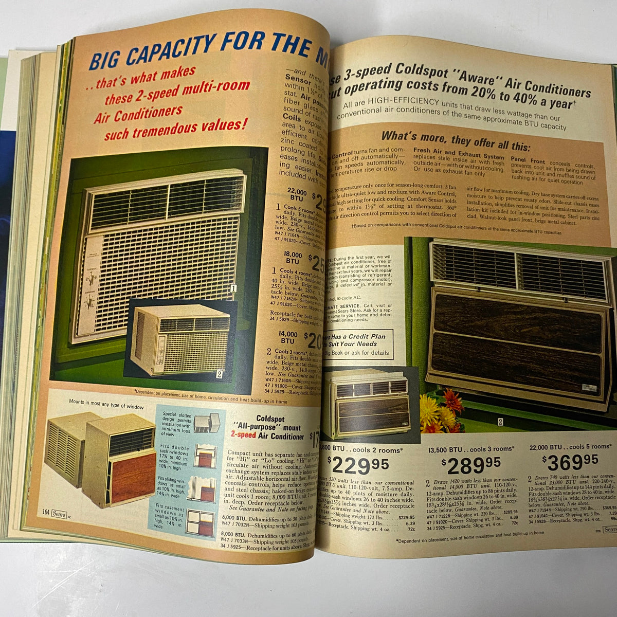 1971 Sears Summer Hardcover Catalog highlighting air conditioners with details on energy efficiency and pricing, representing home appliances of the era.