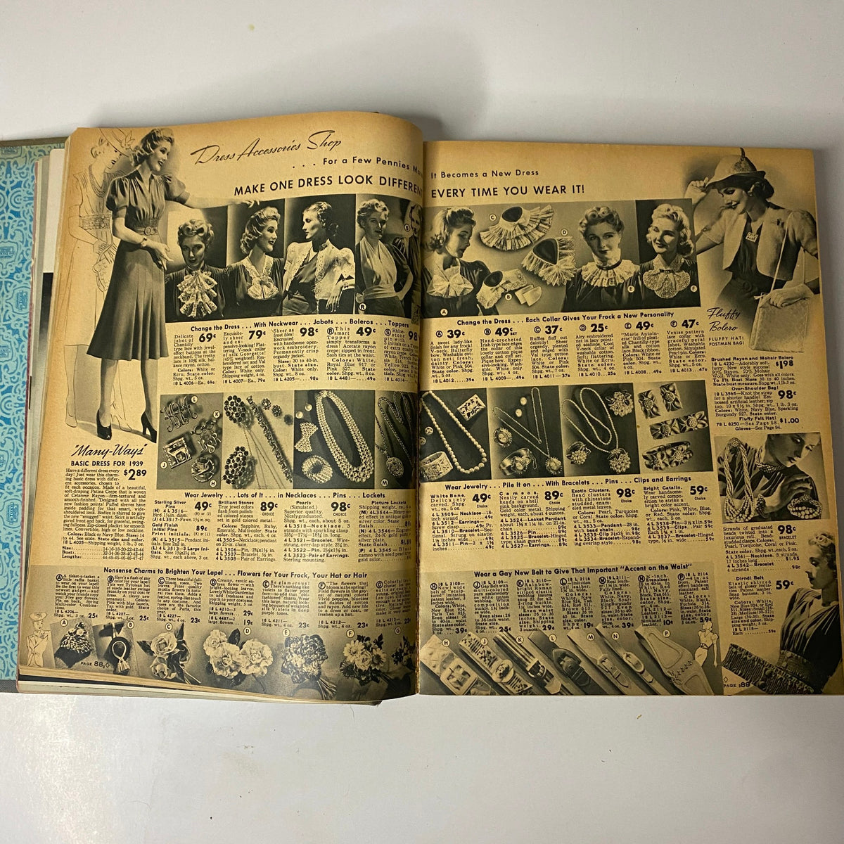 Dress accessories and jewelry options highlighted in the 1939 Sears, Roebuck and Company Spring and Summer Hardcover Catalog, demonstrating how to transform outfits.
