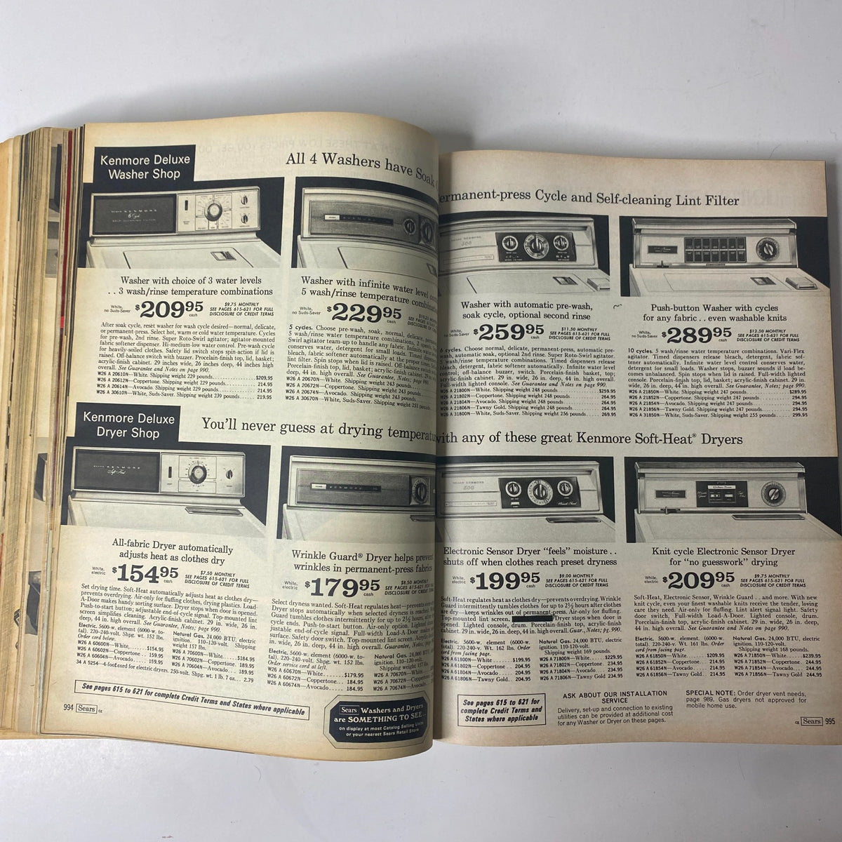 1971 Sears Roebuck and Co. Spring and Summer Catalog presenting Kenmore washing machines and dryers, with specifications and pricing for modern laundry appliances of the era.