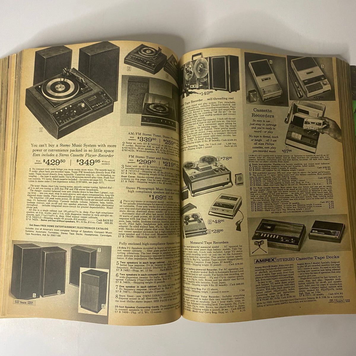 1969 Sears Roebuck and Co. Spring and Summer Catalog showcasing stereo music systems and cassette recorders with detailed prices and specifications.