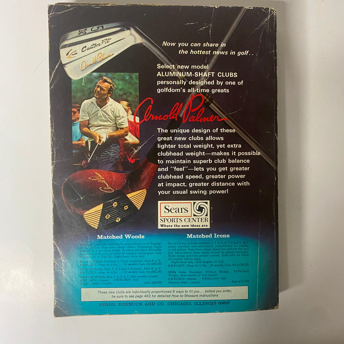 Back cover of the 1969 Sears Roebuck and Co. Spring and Summer Catalog, advertising Arnold Palmer's aluminum-shaft golf clubs with product details and images.