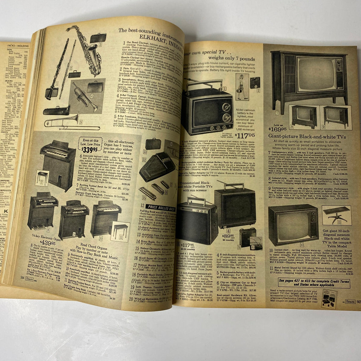Page from the 1970 Sears, Roebuck and Co. Spring and Summer Catalog displaying various electronic instruments and televisions available for purchase.