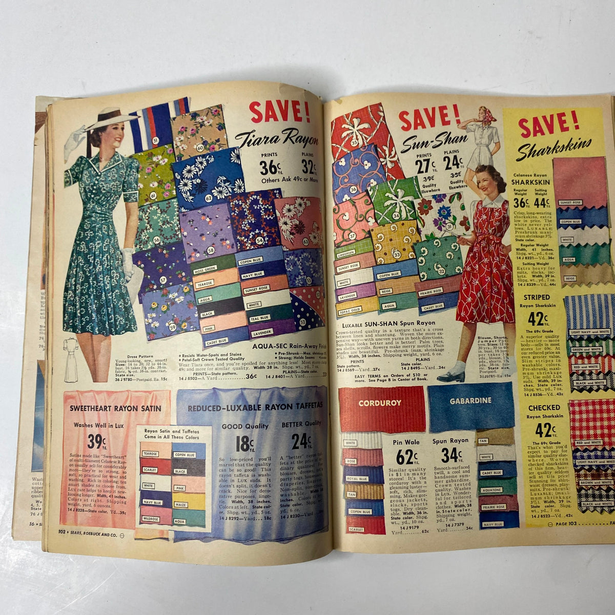 Interior page from the 1941 Sears Midsummer Sale Catalog showcasing colorful fabrics and clothing options, including dresses and summer styles.