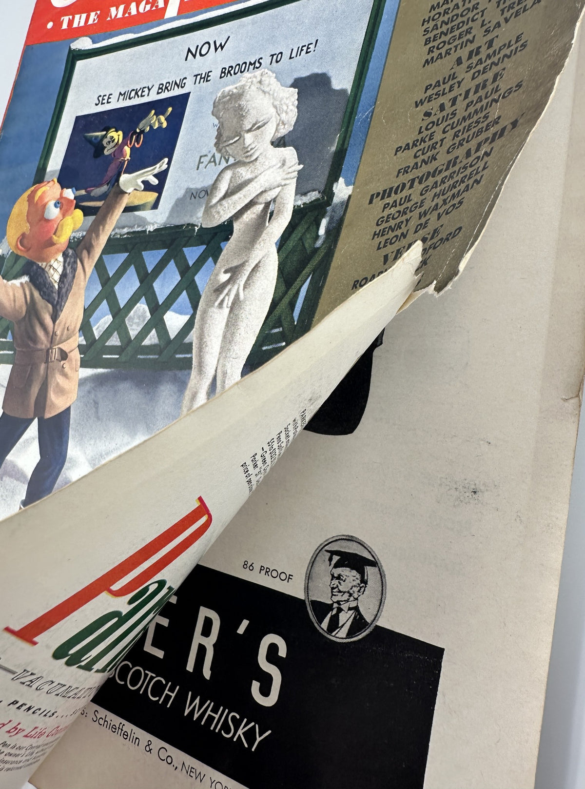 Esquire Magazine January 1942 showcasing an open page with content details, featuring a vintage advertisement and distinctive cover design elements.
