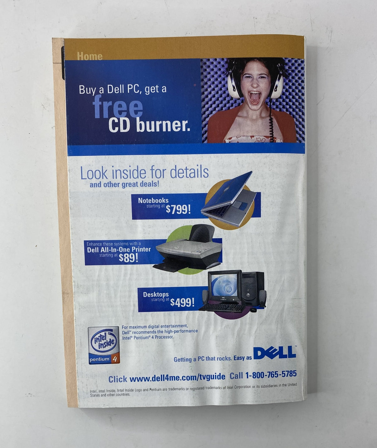 Advertisement page from TV Guide Magazine October 25, 2003 promoting Dell PCs and a free CD burner, highlighting special offers and prices.