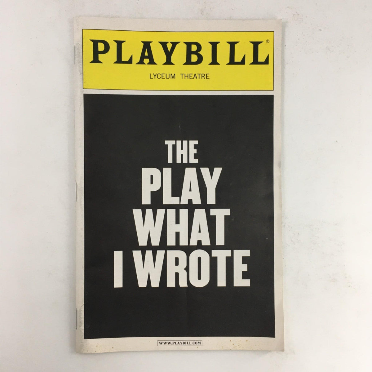 2003 Playbill for 'The Play What I Wrote' at Lyceum Theatre, featuring a minimalist black and yellow cover design.