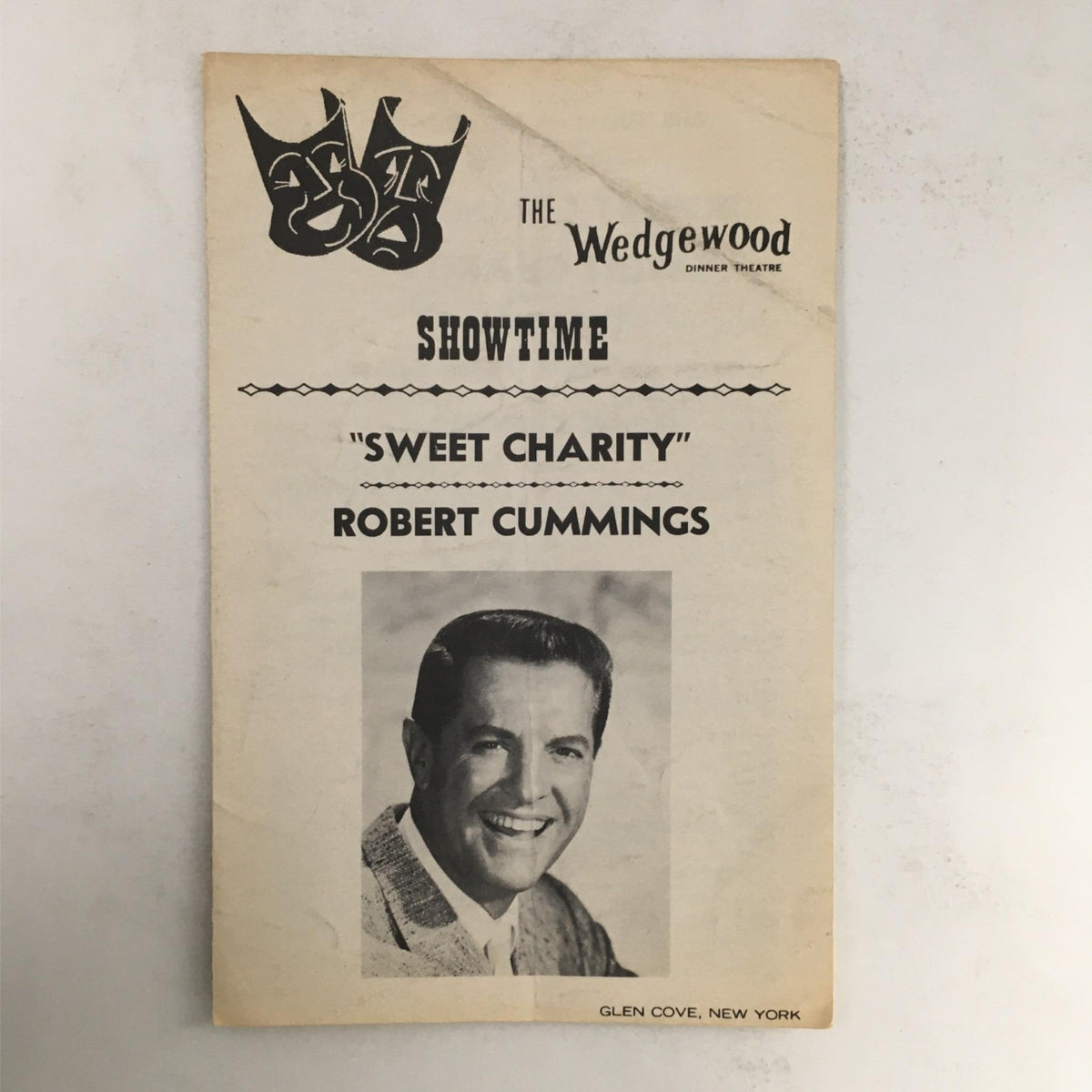 Cover of the 1969 Showtime Sweet Charity program by Robert Cummings at The Wedgewood Dinner Theatre, featuring a portrait of Cummings and vintage design elements.