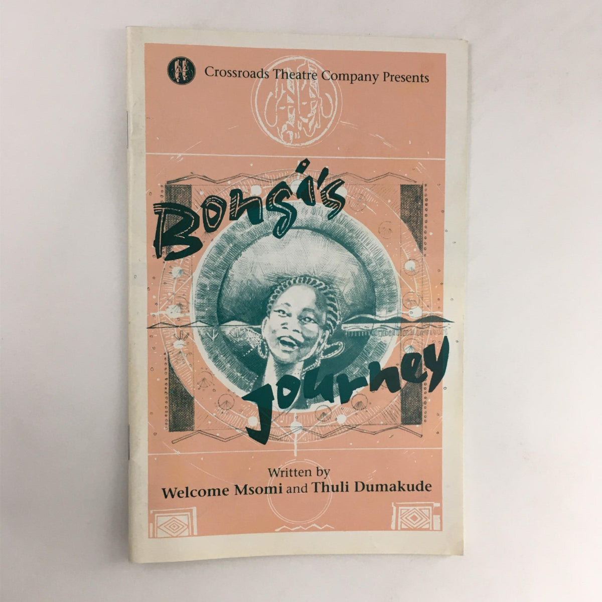 Cover of the 1990-1991 Bongi's Journey by Welcome Msomi and Thuli Dumakude, presented by Crossroads Theatre Company, featuring a portrait of a woman with vibrant graphics.