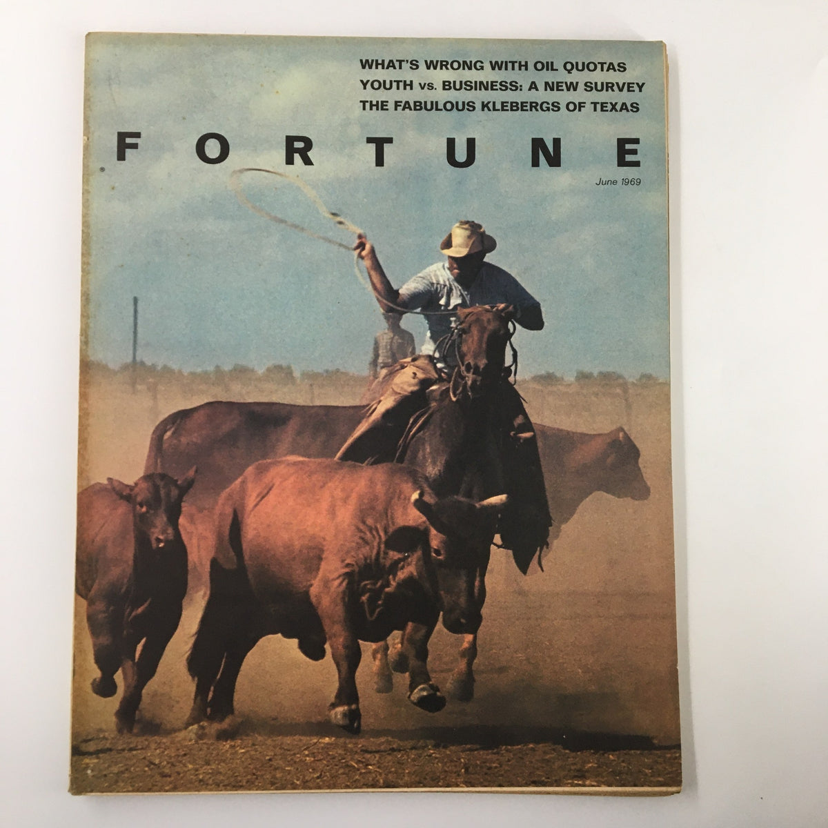 Cover of VTG Fortune Magazine June 1969 featuring The Fabulous Klebergs of Texas, showcasing a cowboy herding cattle in a dusty landscape.