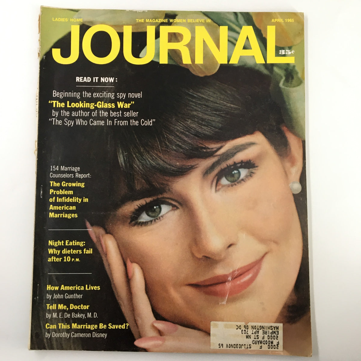 Cover of Ladies' Home Journal Magazine April 1965 featuring the article "The Growing Problem of Infidelity" with an attractive model and yellow font.