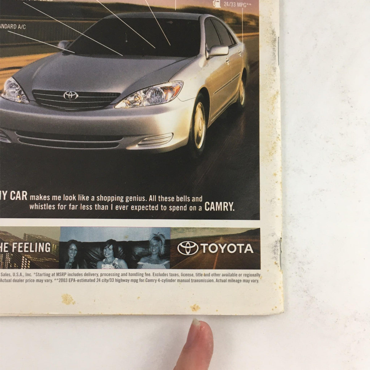 Back cover of the 2003 Playbill for Movin' Out by Twyla Tharp and Billy Joel, featuring an advertisement for a Toyota Camry with a stained edge.