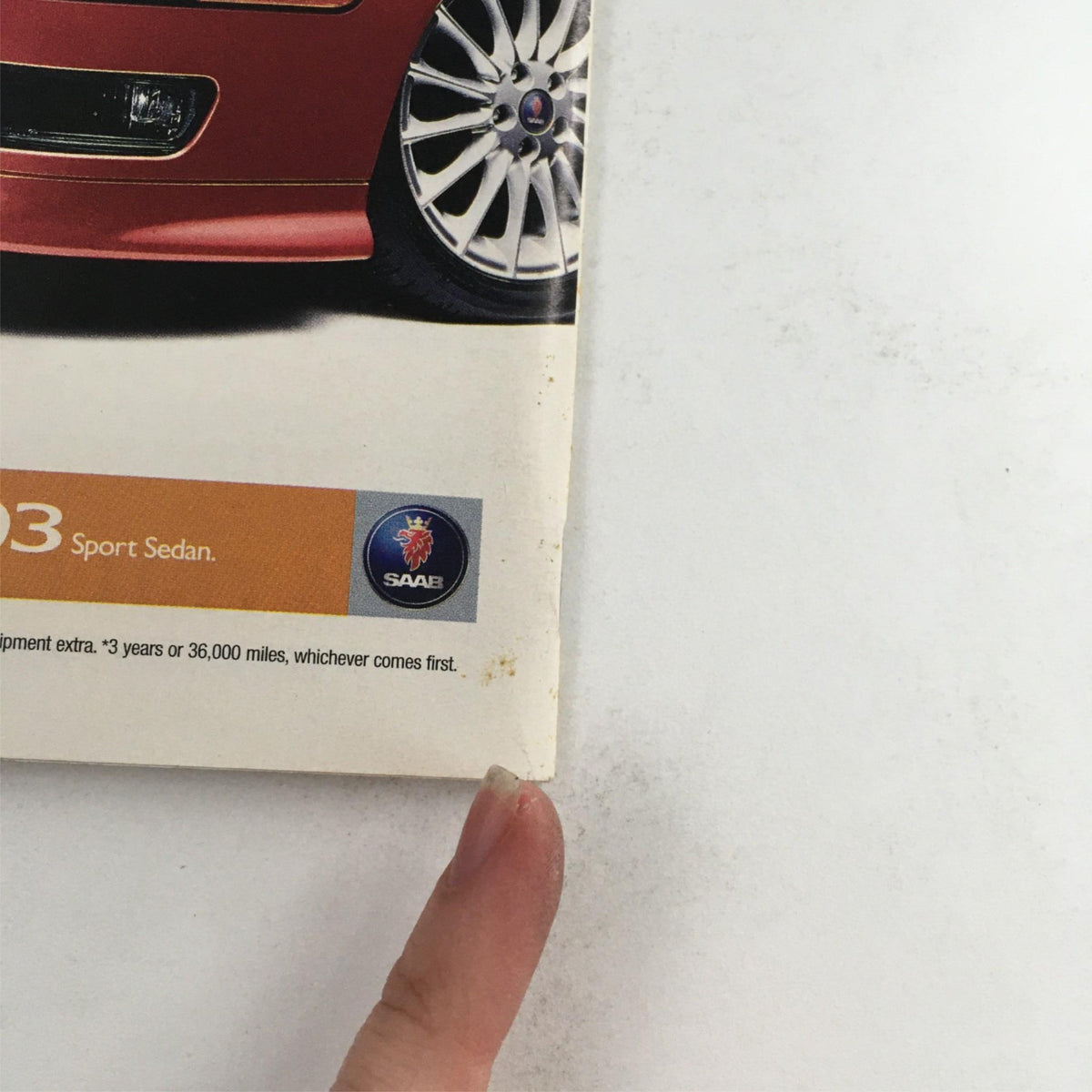 2003 Playbill for The Play What I Wrote featuring Kenneth Branagh and Toby Jones, showcasing details of a Saab Sport Sedan with visible wear and edges, served as a theatrical collectible.