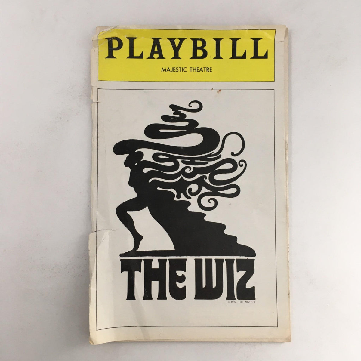 1976 Playbill The Wiz by Ken Harper, George Faison at Majestic Theatre featuring a vintage cover design with an artistic silhouette.