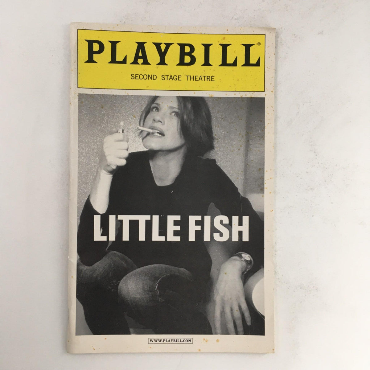 2003 Playbill for 'Little Fish' by Michael John LaChiusa at Second Stage Theatre, featuring a striking black and white cover image of a female actor holding a cigarette.