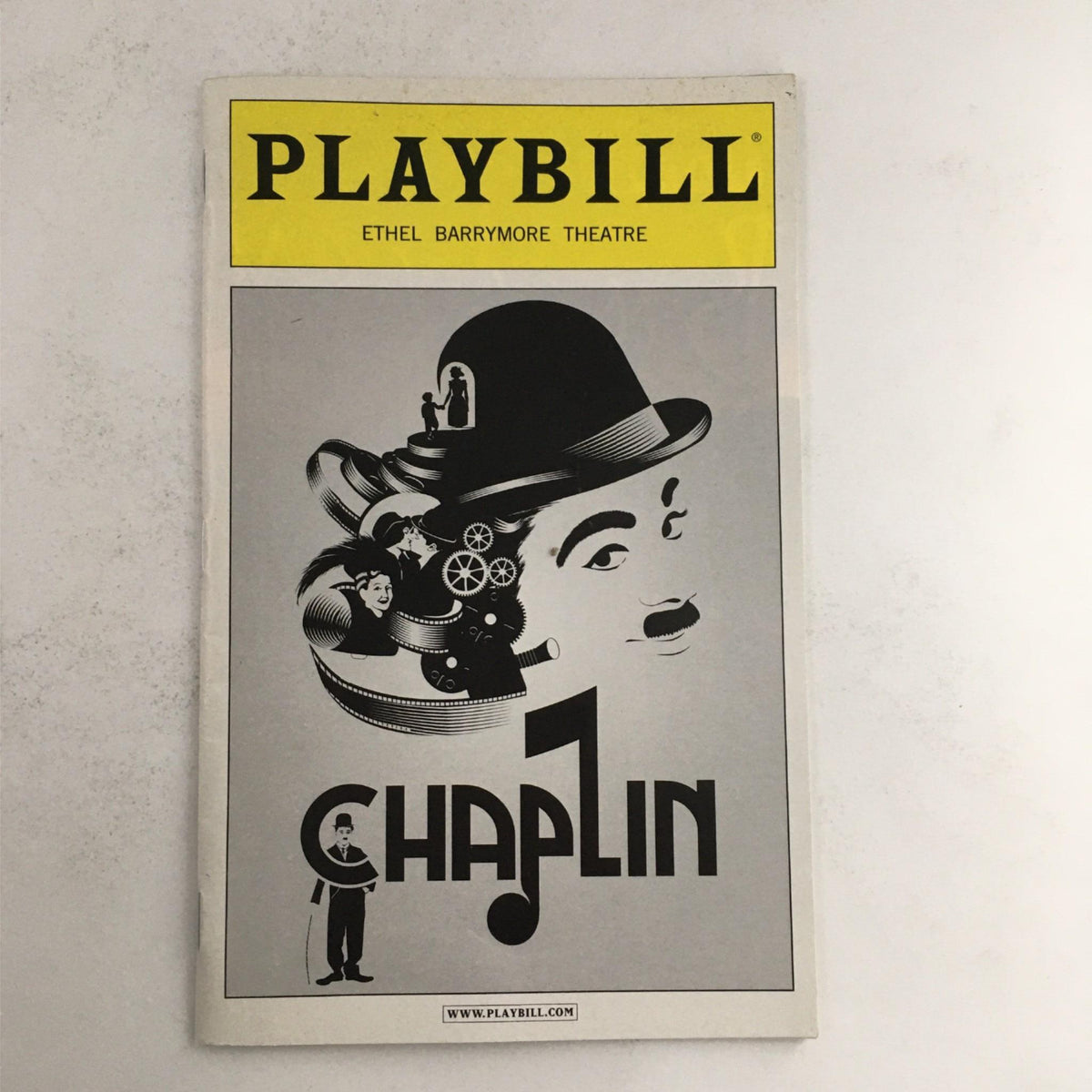 2012 Playbill for 'Chaplin' at Ethel Barrymore Theatre featuring a classic design with Charlie Chaplin's image.