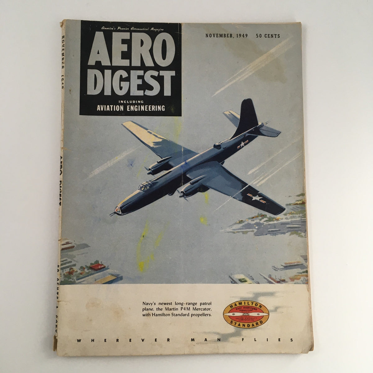 Aero Digest Magazine November 1949 Vol 59 #5 cover, featuring the Martin P4M Mercator aircraft flying over a scenic landscape, highlighting aviation engineering.