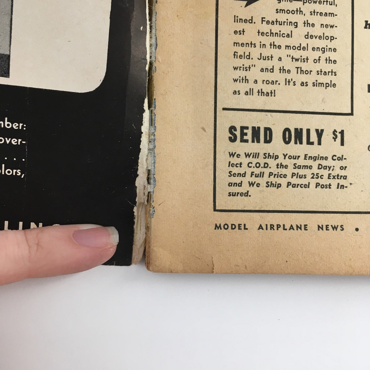 Close-up of the spine and edge of Model Airplane News Magazine - April 1947, showing wear and a lack of a newsstand label.