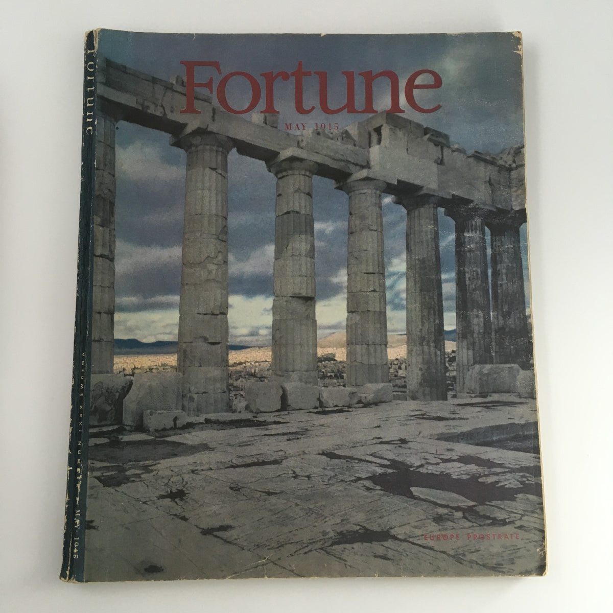 Cover of VTG Fortune Magazine May 1945 featuring columns of ancient ruins symbolizing archaeological significance in post-war Europe.