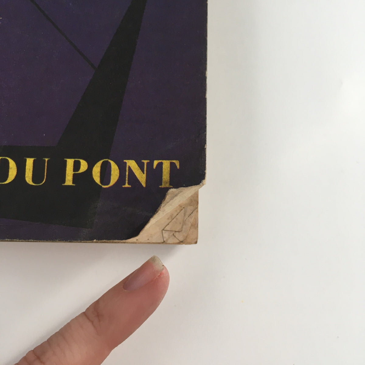 Close-up of the October 1950 VTG Fortune Magazine highlighting Du Pont on the cover, showcasing vintage design and some minor wear.