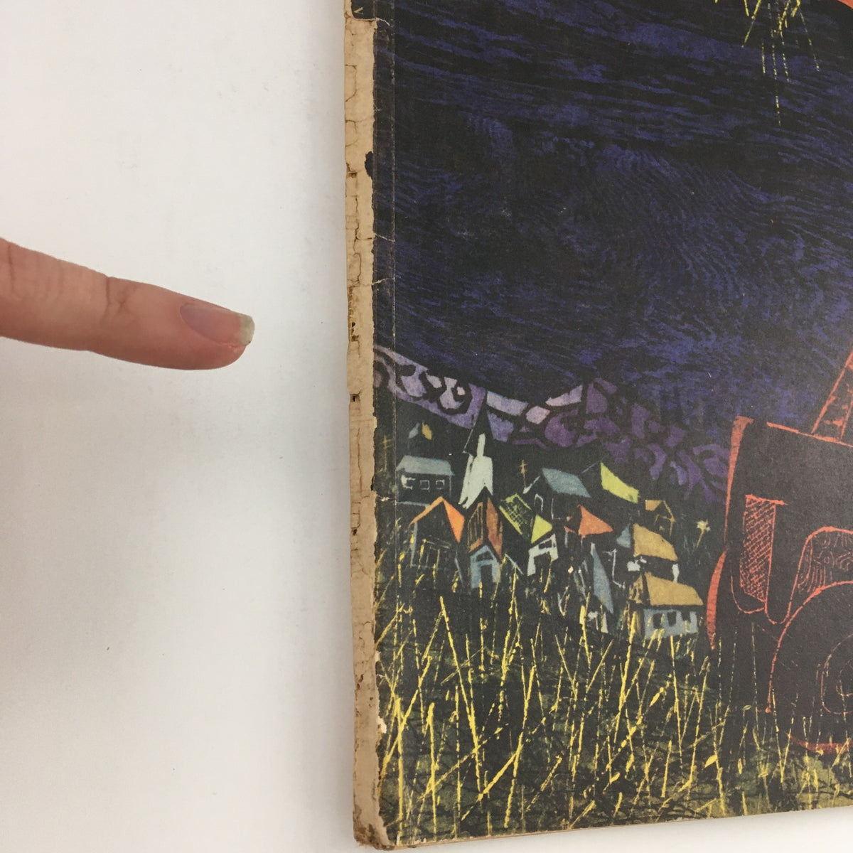 Close-up view of the side of the vintage Fortune Magazine from August 1950, titled 'Winning the Battle of Timber' by Antonio Frasconi, showcasing its aged cover and rustic charm with visible signs of wear.