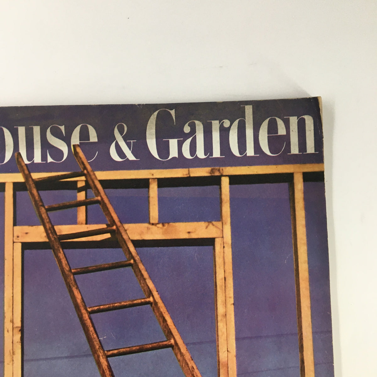 Detailed view of the top portion of VTG House & Garden Magazine February 1946 cover, with prominent text and an image of a wooden ladder.
