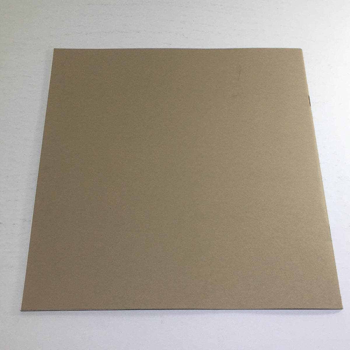 Back cover of the 1976 Cadillac Seville and El Dorado Dealership Car Auto Brochure Catalog, plain without any branding.
