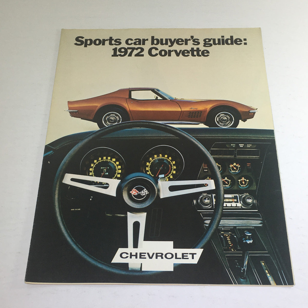 Cover of the 1972 Chevrolet Corvette Stingray dealership brochure featuring a sleek Corvette design and interior layout.