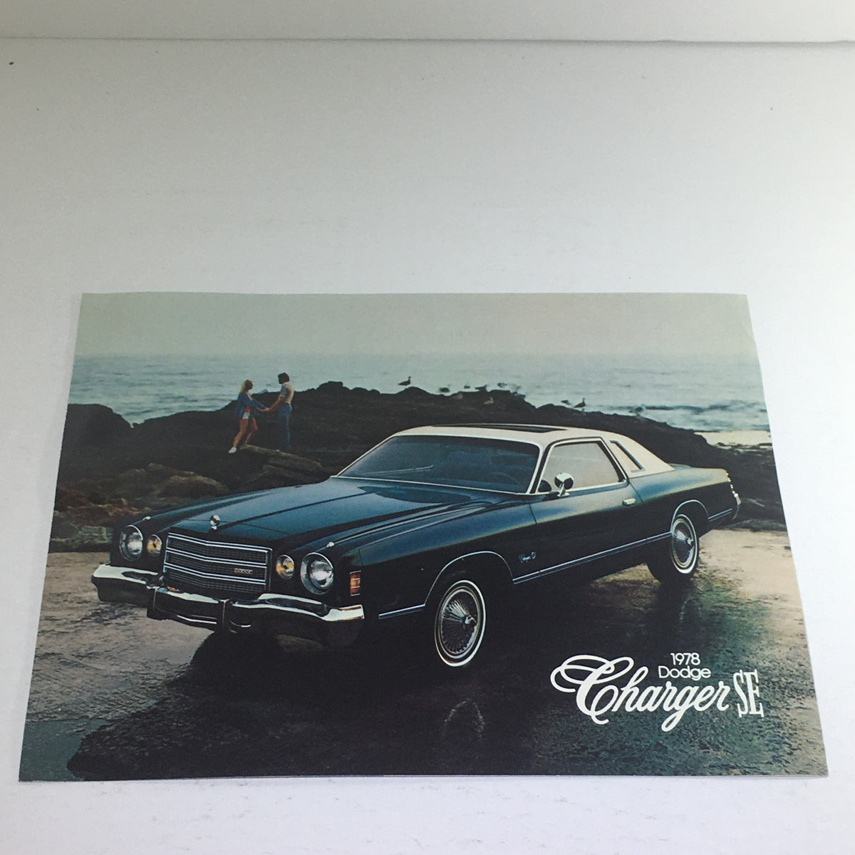 1978 Dodge Charger SE Sedan showcased in a scenic outdoor setting, emphasizing its sleek design and classic styling.