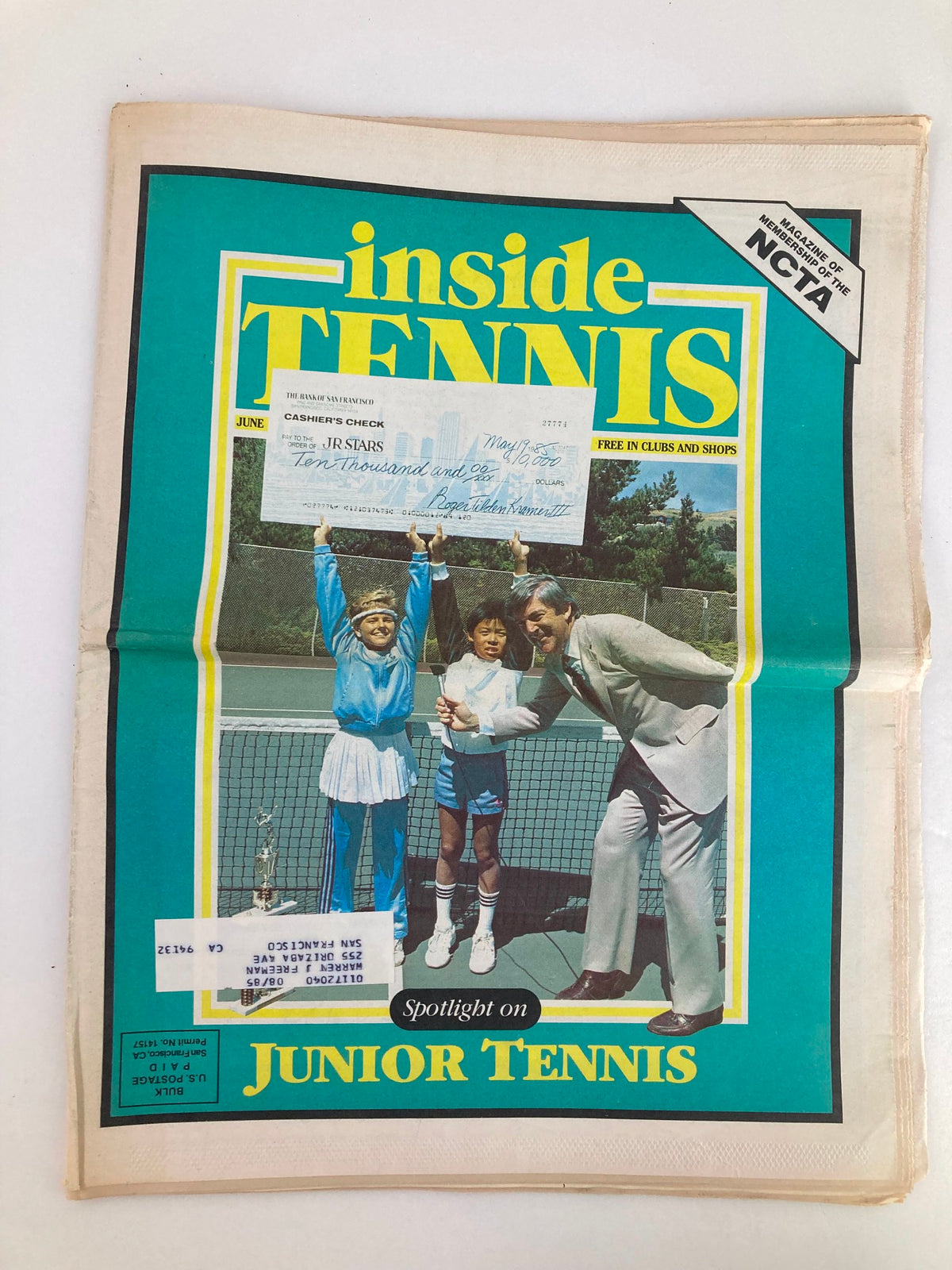 Cover of VTG Inside Tennis Magazine June 1985 featuring a spotlight on Junior Tennis, showcasing young tennis players celebrating with a trophy and a notable figure in a suit.