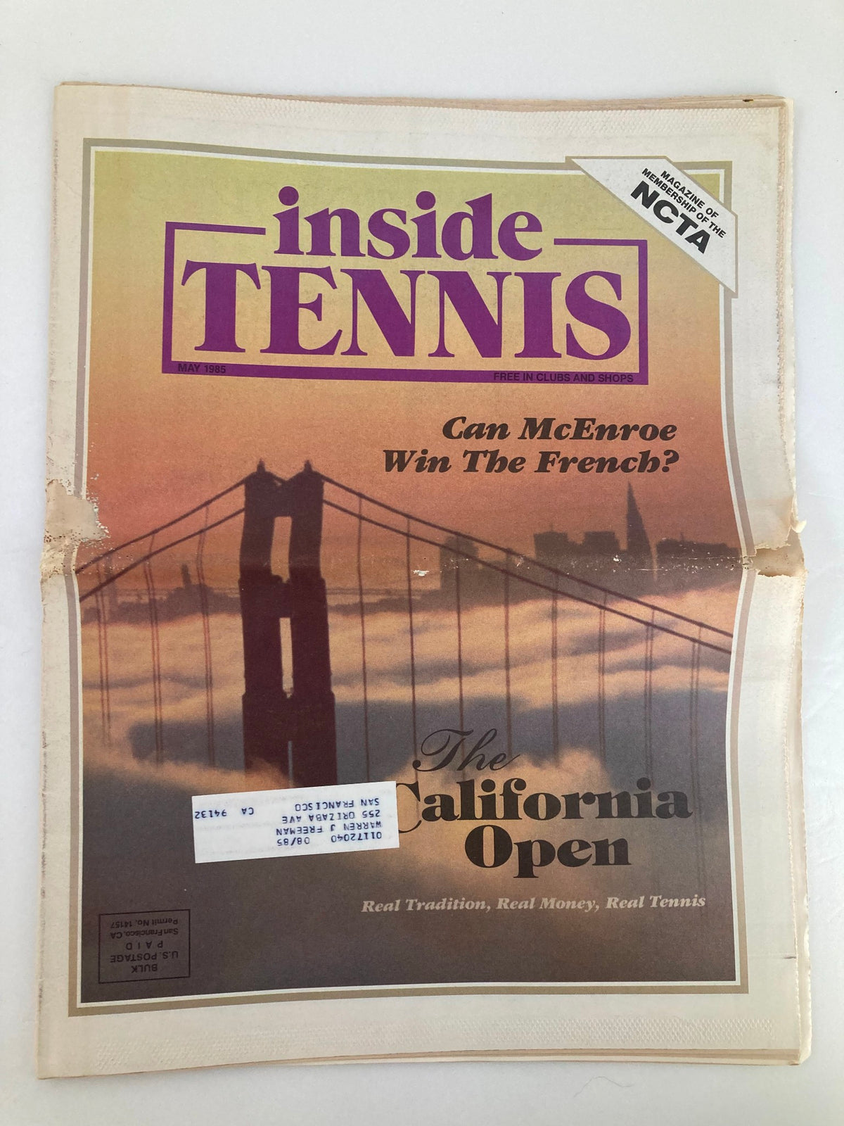 Cover of the Inside Tennis magazine from May 1985, titled 'Can John McEnroe Win The French?' featuring a silhouette of a famous bridge and sunset background.