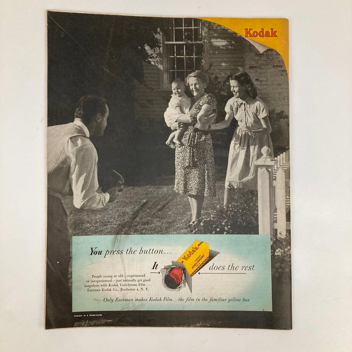 Vintage advertisement from Saturday Evening Post Magazine August 28 1948 for Kodak Film, showing a family portrait scene with a woman holding a baby and another woman, emphasizing the ease of photography with Kodak.