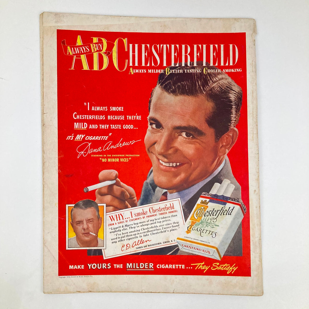Cover page of the Saturday Evening Post Magazine January 8 1949 featuring an advertisement for Chesterfield cigarettes with a smiling man holding a cigarette, promoting the brand's mild taste.