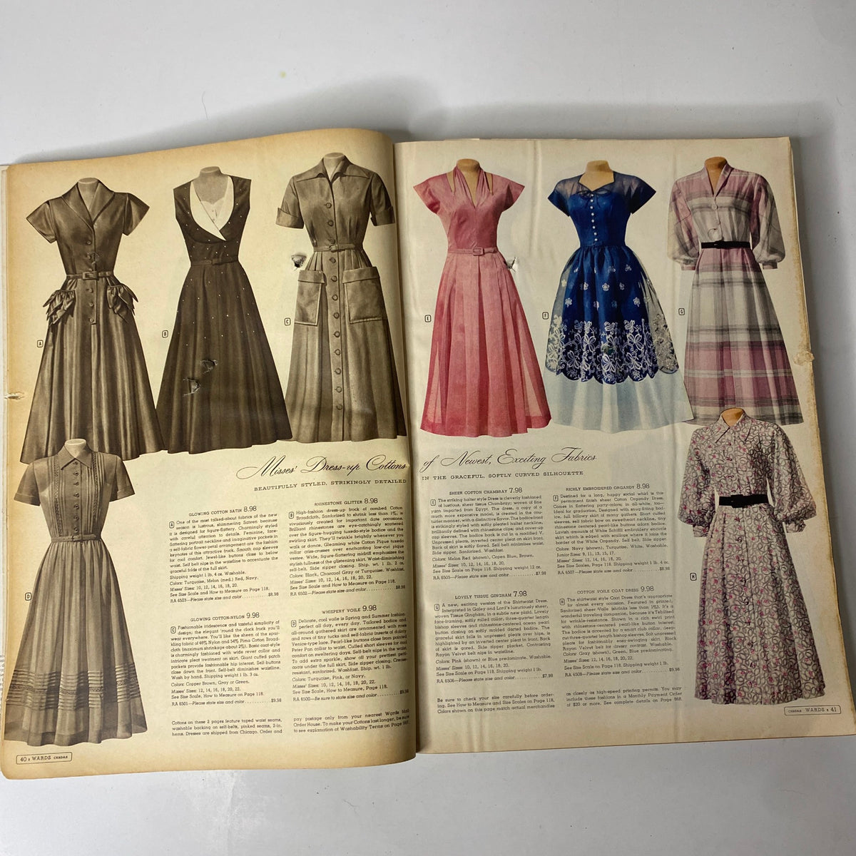 Illustration of various vintage dresses featured in the 1952 Montgomery Ward Albany Spring and Summer Catalog, showcasing mid-century fashion styles.