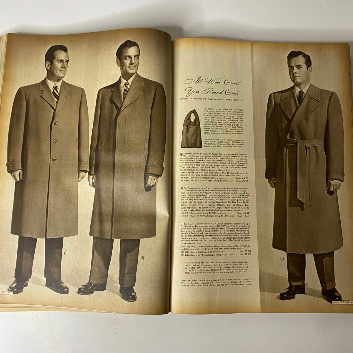 1949-1950 Montgomery Ward Baltimore Fall and Winter Catalog displaying men's elegant wool coats, emphasizing classic tailoring and styles from the late 1940s.