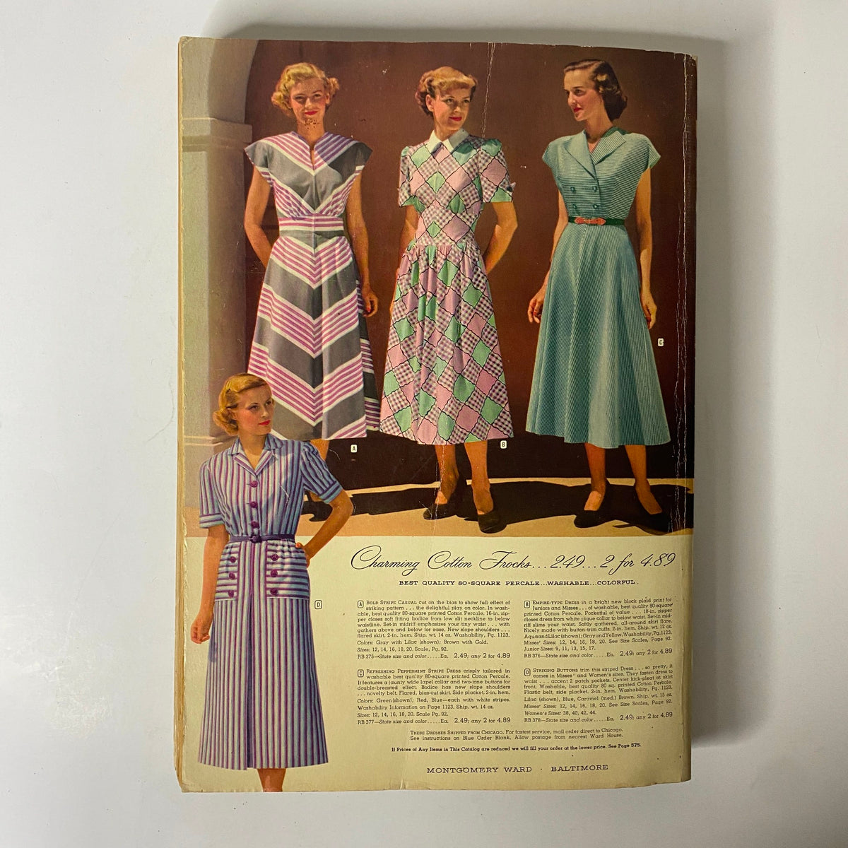 Back cover of the 1949-1950 Montgomery Ward Baltimore Fall and Winter Catalog showcasing various charming cotton frocks with detailed descriptions and pricing.