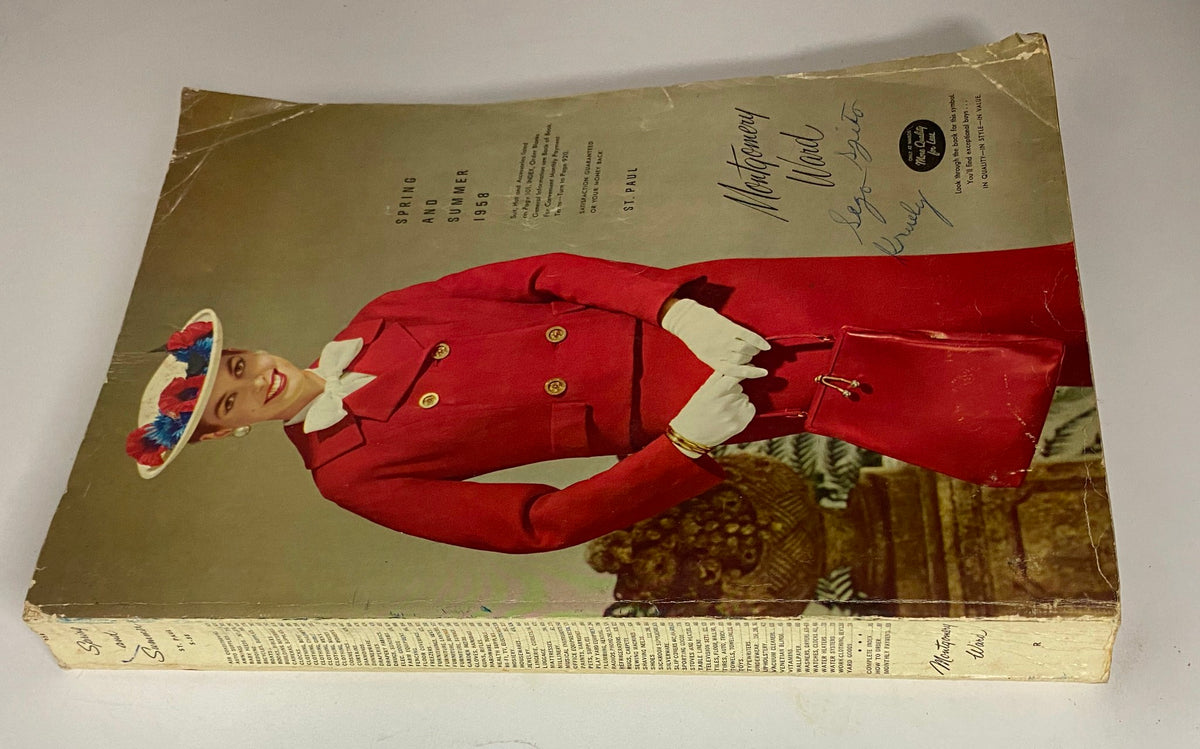 Side view of the 1958 Montgomery Ward Spring and Summer Catalog displaying a model in a red outfit with gloves and a matching handbag. This vintage catalog reflects the style of the late 1950s.