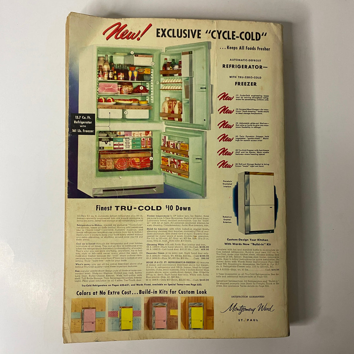 Back cover of the 1958 Montgomery Ward Spring and Summer Catalog displaying a vintage refrigerator with product details and pricing information.