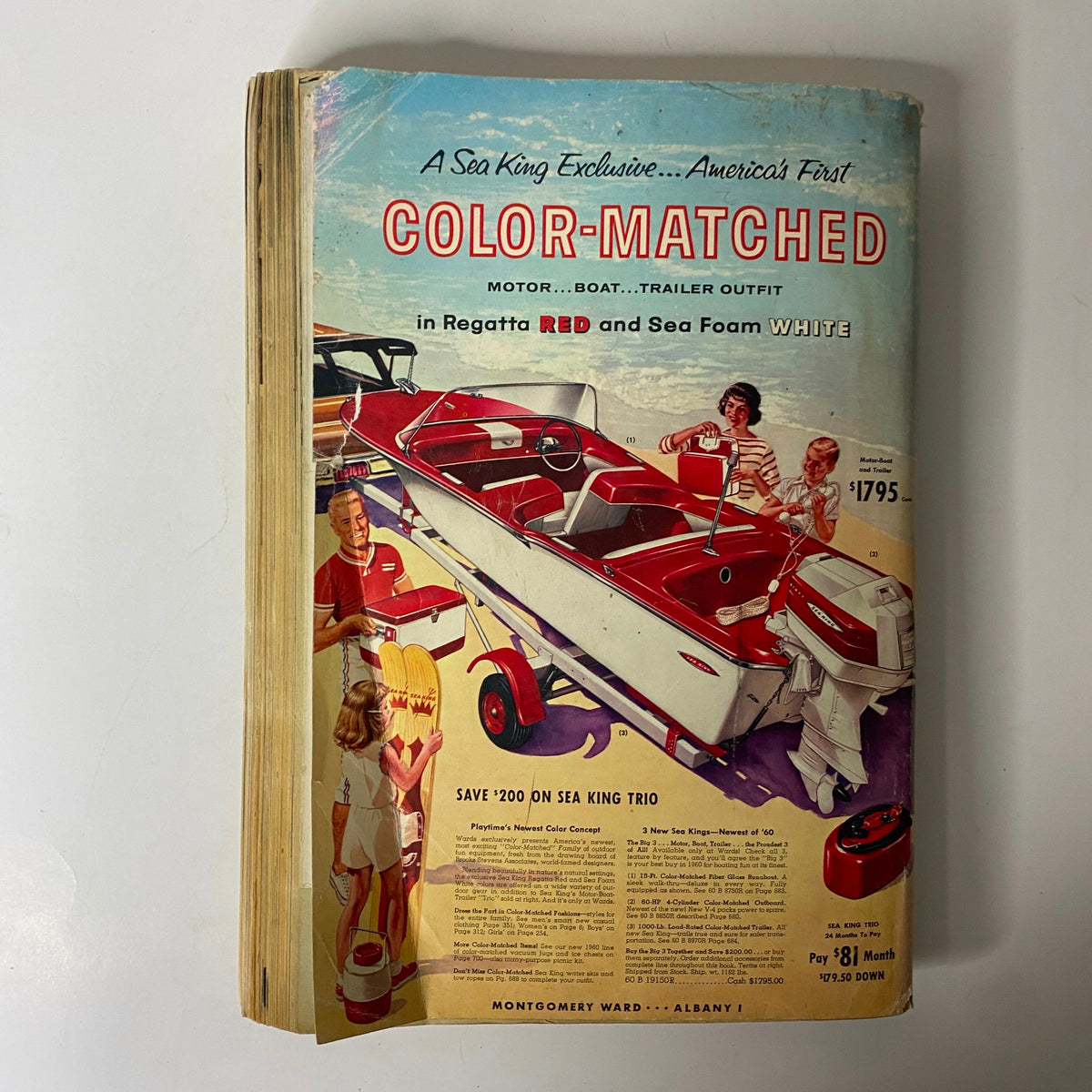 Cover of the 1960 Montgomery Ward Spring and Summer Catalog highlighting a color-matched boat and trailer, embodying the vintage summer lifestyle.
