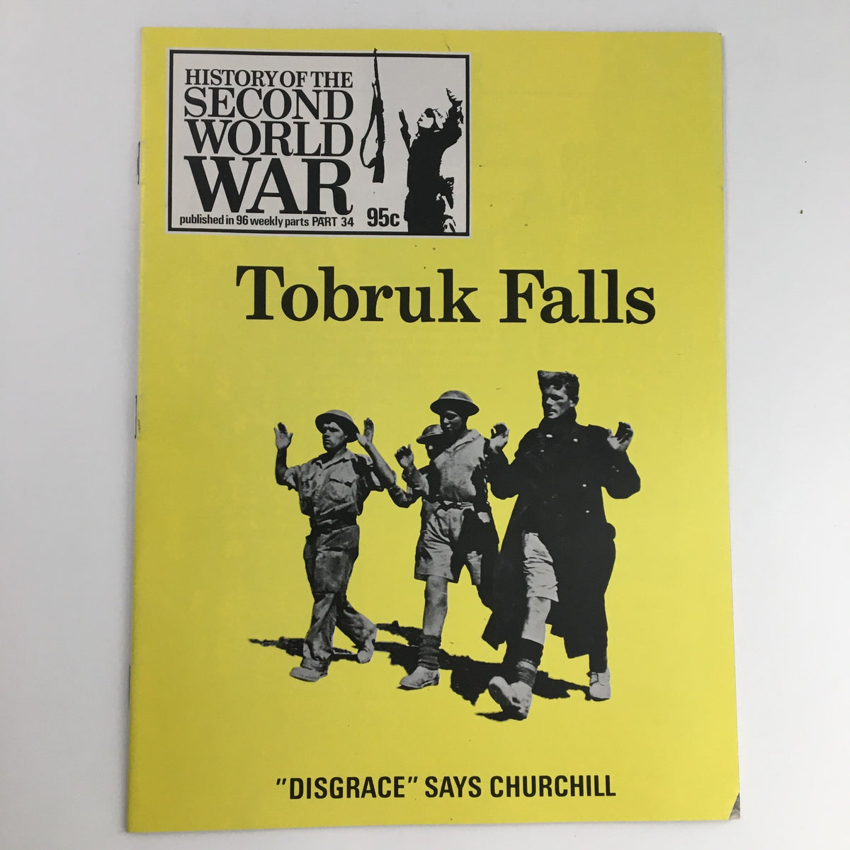 Cover of History of the Second World War Part 33, 1973, titled 'Tobruk Falls', featuring soldiers and the quote 'Disgrace' Says Churchill on a bright yellow background.