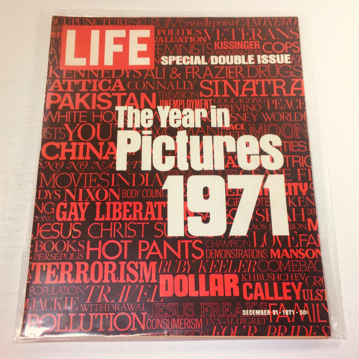 VTG Life Magazine: December 31 1971 cover featuring 'The Year in Pictures 1971' with bold red and black design, showcasing iconic headlines and cultural moments from the year.