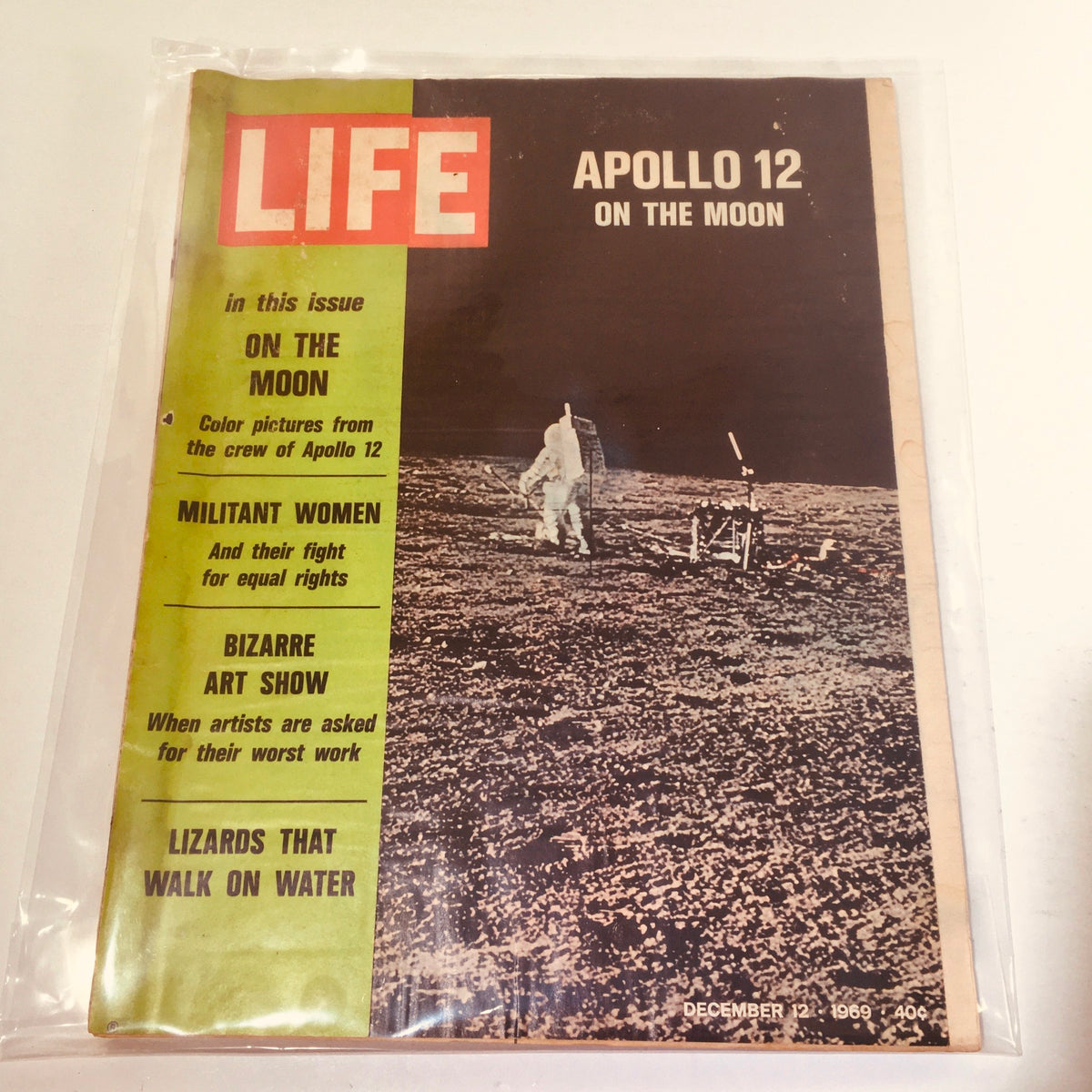 Cover of VTG Life Magazine dated December 12, 1969, featuring Apollo 12 on the Moon, with sections on color pictures from the crew, militant women, bizarre art show, and lizards that walk on water.