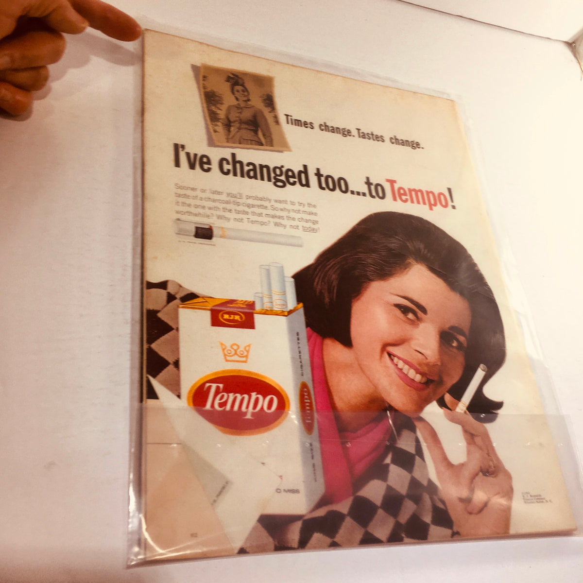 Vintage advertisement from VTG Life Magazine dated June 3, 1966 promoting Tempo cigarettes with a smiling woman, illustrating the changing tastes of the era.