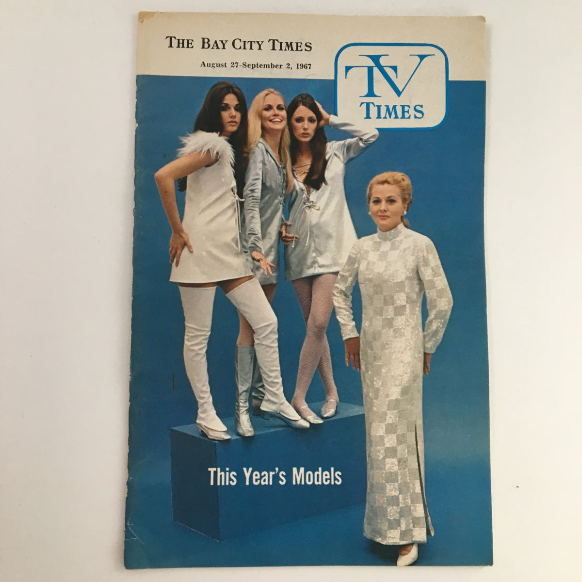 Cover of TV Times Bay City Michigan August 27-September 2, 1967 featuring models in silver outfits for the article "This Year's Model."