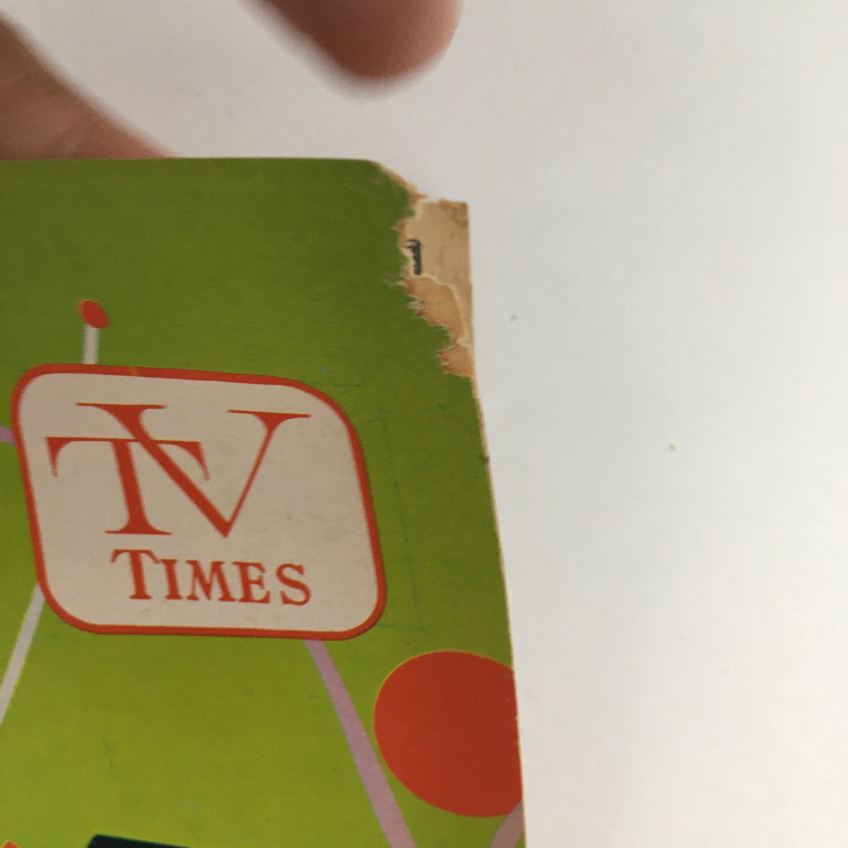 Close-up of the top corner of the TV Times Bay City Michigan December 31-January 6 1968, highlighting the vintage magazine's logo and slight wear, emphasizing its collectible nature.