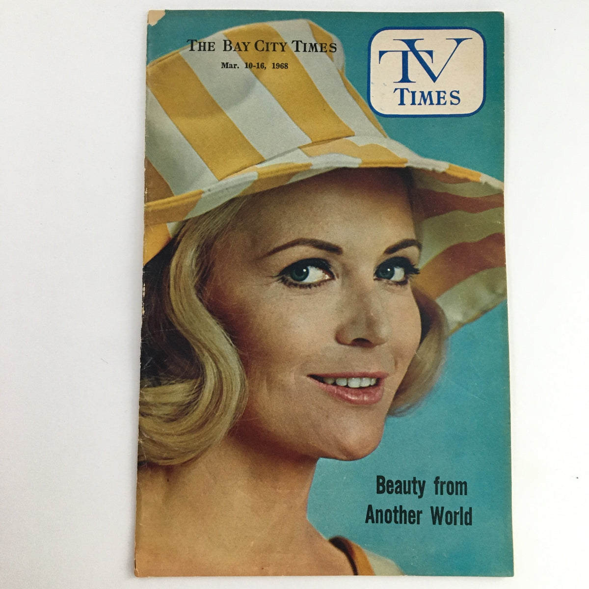 Cover of TV Times Bay City Michigan March 10-16 1968, featuring a woman with blonde hair wearing a striped yellow and white hat, titled 'Beauty from Another World'.