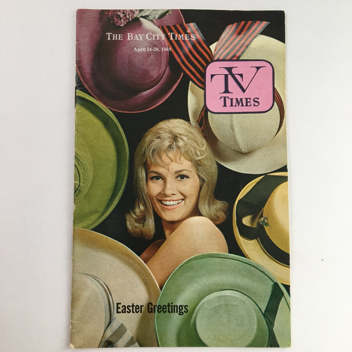 Cover of TV Times Bay City Michigan April 14-20 1968 Easter Greetings featuring a blonde woman surrounded by colorful hats.