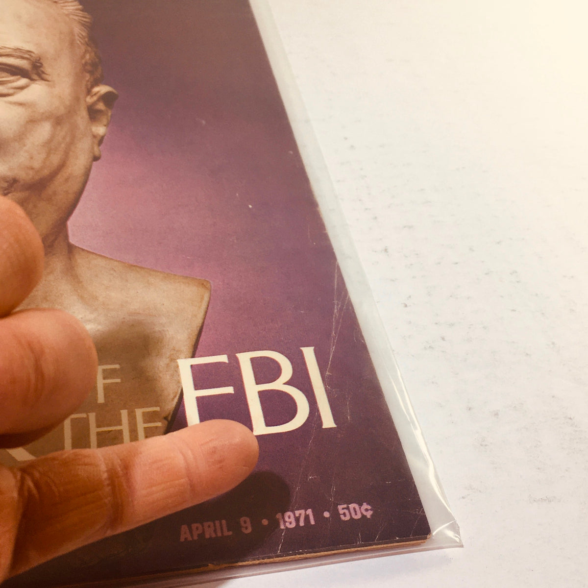 Close-up view of the vintage Life Magazine cover from April 9, 1971, with a bust of J. Edgar Hoover prominently displayed. The cover includes the title 'EMPEROOR OF THE FBI' and the publication date, showcasing this rare collectible.
