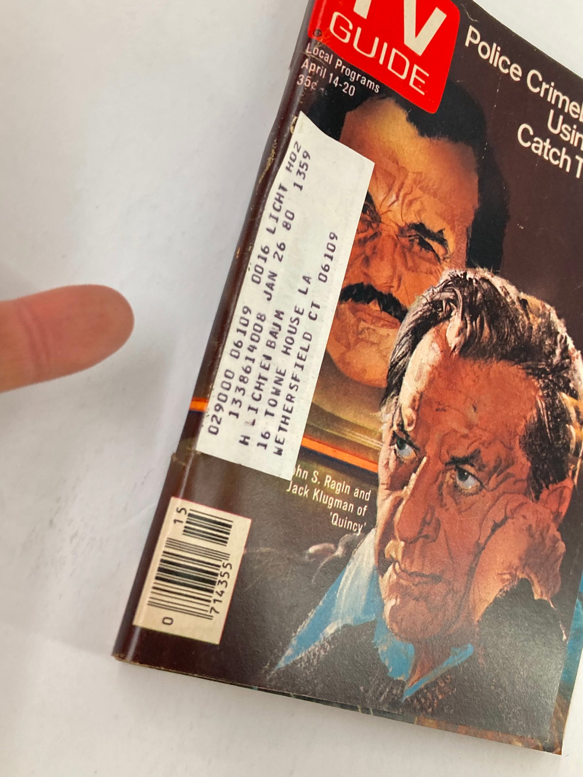 Close-up view of the TV Guide Magazine April 14 1979 Issue #1359, highlighting the cover design featuring John Ragin and details such as the barcode and local program information.