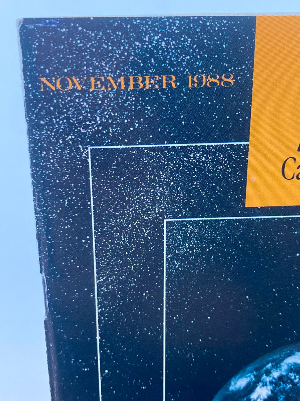 Cover of the VTG A&E Cable Network Program Guide from November 1988, displaying the month and year along with a starry background, emphasizing the JFK Assassination coverage.