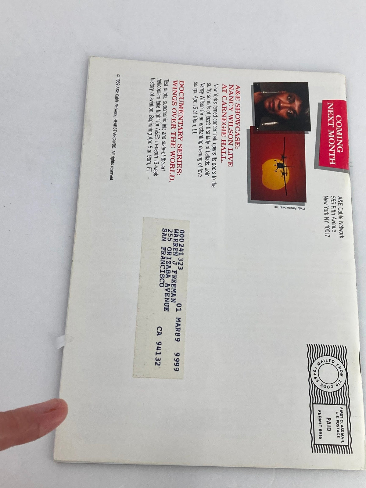 Back cover of the VTG A&E Cable Network Program Guide March 1989 showing promotional information and an address label, common for vintage magazine mailings.